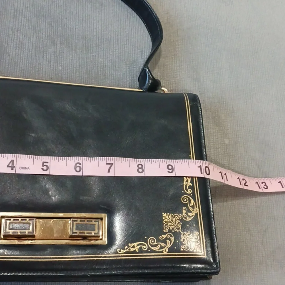 Black Shoulder Bag with Gold Accents